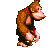 Donkey Kong sitting down to scratch his head
