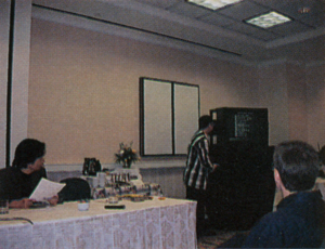 Takashi Tezuka at E3 1998 Press Conference (64Dream 1998-08).png